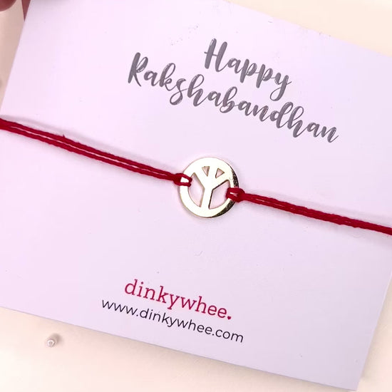 Peace gold plated rakhi