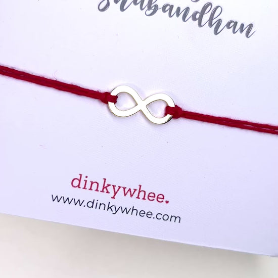 Infinity gold plated rakhi